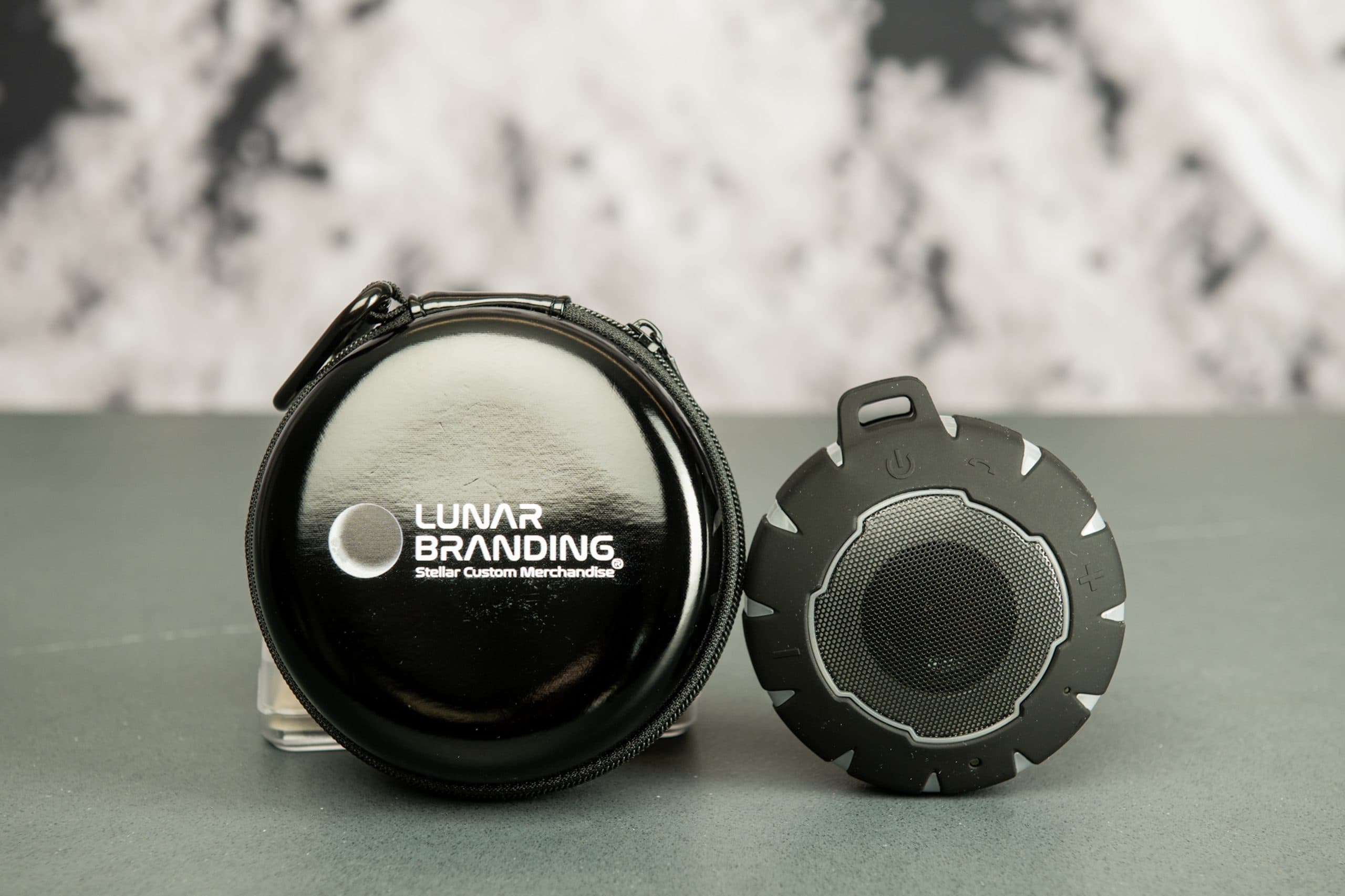 Branded Bluetooth speaker with carrying case